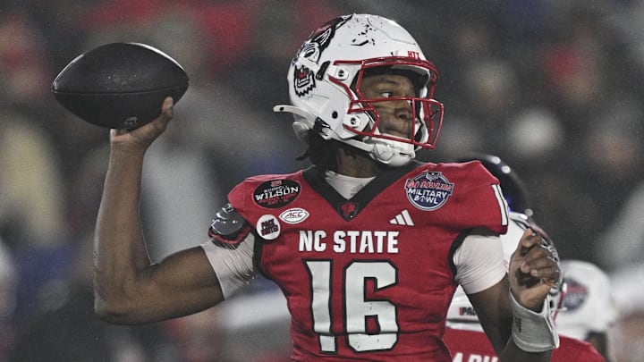 Dec 28, 2024; Annapolis, MD, USA; North Carolina State Wolfpack quarterback CJ Bailey (16) throws from the pocket during the first half of the the Go Bowling Military Bowl against the East Carolina Pirates at Navy-Marine Corps Memorial Stadium. Mandatory Credit: Tommy Gilligan-Imagn Images Dec 28, 2024; Annapolis, MD, USA; North Carolina State Wolfpack quarterback CJ Bailey (16) throws from the pocket during the first half of the the Go Bowling Military Bowl against the East Carolina Pirates at Navy-Marine Corps Memorial Stadium. Mandatory Credit: Tommy Gilligan-Imagn Images