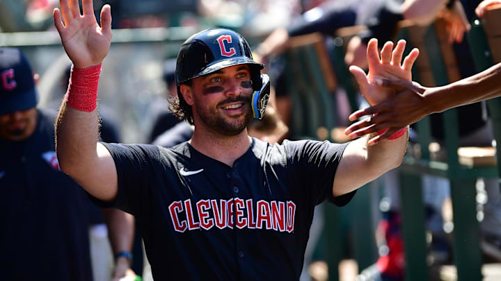 May 26, 2024; Anaheim, California, USA; Cleveland Guardians catcher Austin Hedges (27) is greeted after scoring a run against the Los Angeles Angels during the sixth inning at Angel Stadium. Mandatory Credit: Gary A. Vasquez-Imagn Images May 26, 2024; Anaheim, California, USA; Cleveland Guardians catcher Austin Hedges (27) is greeted after scoring a run against the Los Angeles Angels during the sixth inning at Angel Stadium. Mandatory Credit: Gary A. Vasquez-Imagn Images