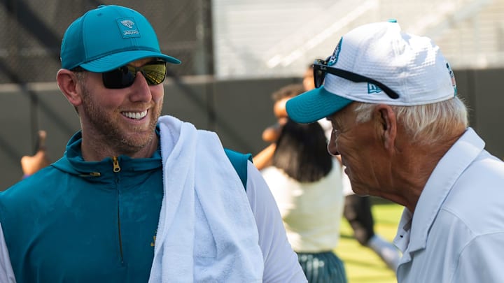 Jacksonville Jaguars head coach Liam Coen, left has a laugh with his dad Tim Coen after practice during an NFL training camp fifth session at the Miller Electric Center, Monday, July 28, 2025, in Jacksonville, Fla. [Doug Engle/Florida Times-Union]