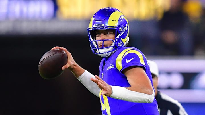 Nov 24, 2024; Inglewood, California, USA; Los Angeles Rams quarterback Matthew Stafford (9) throws against the Philadelphia Eagles during the second half at SoFi Stadium. Mandatory Credit: Gary A. Vasquez-Imagn Images