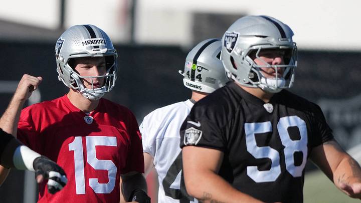 Jun 9, 2026; Henderson, NV, USA; Las Vegas Raiders guard Caleb Rogers (76), quarterback Fernando Mendoza (15) and guard Jackson Powers-Johnson (58) during minicamp at Intermountain Health Performance Center. Mandatory Credit: Kirby Lee-Imagn Images Jun 9, 2026; Henderson, NV, USA; Las Vegas Raiders guard Caleb Rogers (76), quarterback Fernando Mendoza (15) and guard Jackson Powers-Johnson (58) during minicamp at Intermountain Health Performance Center. Mandatory Credit: Kirby Lee-Imagn Images