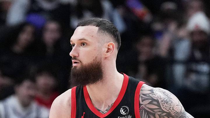 Toronto Raptors forward Sandro Mamukelashvili controls the ball as LA Clippers center Ivica Zubac tries to defend. Toronto Raptors forward Sandro Mamukelashvili controls the ball as LA Clippers center Ivica Zubac tries to defend.
