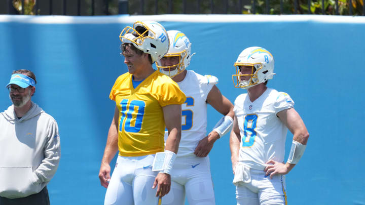 May 29, 2024; Costa Mesa, CA, USA; Los Angeles Chargers passing game coordinator Marcus Brady, quarterbacks coach Shane Day and quarterbacks Justin Herbert (10), Casey Bauman (16) and Max Duggan (8) during organized team activities at Hoag Performance Center. Mandatory Credit: Kirby Lee-USA TODAY Sports