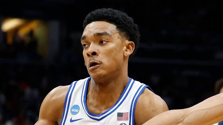 Mar 29, 2026; Washington, DC, USA; Duke Blue Devils guard Caleb Foster (1) and UConn Huskies forward Jayden Ross (23) go for the ball in the first half during an Elite Eight game of the East Regional of the men's 2026 NCAA Tournament at Capital One Arena. Mandatory Credit: Amber Searls-Imagn Images Mar 29, 2026; Washington, DC, USA; Duke Blue Devils guard Caleb Foster (1) and UConn Huskies forward Jayden Ross (23) go for the ball in the first half during an Elite Eight game of the East Regional of the men's 2026 NCAA Tournament at Capital One Arena. Mandatory Credit: Amber Searls-Imagn Images