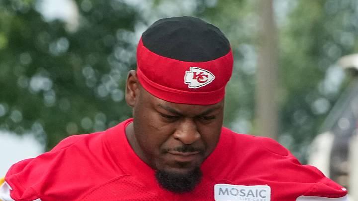 Jul 29, 2026; St. Joseph, MO, USA; Kansas City Chiefs guard Trey Smith (65) walks down the hill to the practice fields during training camp at Missouri Western State University. Mandatory Credit: Denny Medley-Imagn Images