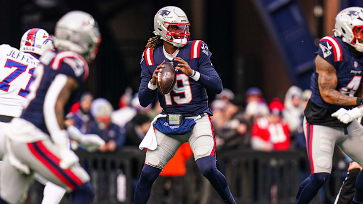 Jan 5, 2025; Foxborough, Massachusetts, USA; New England Patriots quarterback Joe Milton III (19) throws a pass against the Buffalo Bills in the first half at Gillette Stadium. Mandatory Credit: David Butler II-Imagn Images