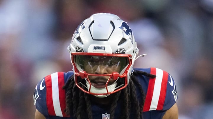 Dec 15, 2024; Glendale, Arizona, USA; New England Patriots safety Kyle Dugger (23) against the Arizona Cardinals at State Farm Stadium. Mandatory Credit: Mark J. Rebilas-Imagn Images