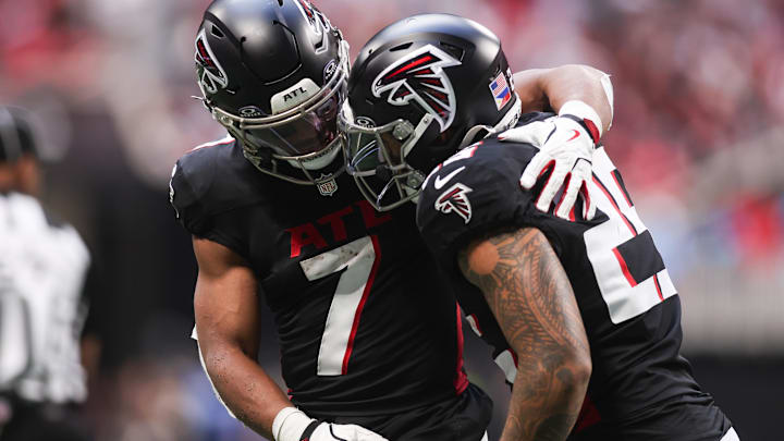 Atlanta Falcons running back Bijan Robinson and running back Tyler Allgeier celebrate a touchdown.