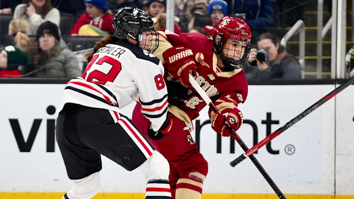 Emma Conner hits Alessia Baechler's stick out of her hands while firing a shot at TD Garden on Jan. 20, 2026.