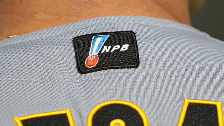 Mar 15, 2025; Bunkyo, Tokyo, Japan; The Nippon Professional Baseball Organization logo is affixed to the back of the jersey of Hanshin Tigers designated hitter Ukyo Maegawa (58) before the game against the Chicago Cubs at Tokyo Dome. Mandatory Credit: Darren Yamashita-Imagn Images