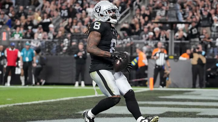 Dec 22, 2024; Paradise, Nevada, USA; Las Vegas Raiders running back Ameer Abdullah (8) celebrates after scoring on a 7-yard touchdown run in the second half against the Jacksonville Jaguars at Allegiant Stadium. Mandatory Credit: Kirby Lee-Imagn Images Dec 22, 2024; Paradise, Nevada, USA; Las Vegas Raiders running back Ameer Abdullah (8) celebrates after scoring on a 7-yard touchdown run in the second half against the Jacksonville Jaguars at Allegiant Stadium. Mandatory Credit: Kirby Lee-Imagn Images