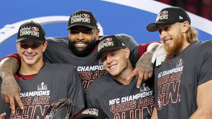 Jan 28, 2024; Santa Clara, California, USA; (Left to right) San Francisco 49ers linebacker Fred Warner (54), quarterback Brock Purdy (13), offensive tackle Trent Williams (71), wide receiver Deebo Samuel (19), running back Christian McCaffrey (23), tight end George Kittle (85) celebrate after winning the NFC Championship football game against the Detroit Lions at Levi's Stadium. Mandatory Credit: Kyle Terada-Imagn Images