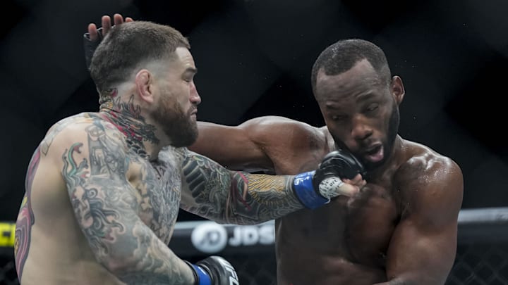 Mar 22, 2025; London, England, United Kingdom; Leon Edwards (red gloves) fights against Sean Brady (blue gloves) during UFC Fight Night at O2 Arena. Mandatory Credit: Peter van den Berg-Imagn Images Mar 22, 2025; London, England, United Kingdom; Leon Edwards (red gloves) fights against Sean Brady (blue gloves) during UFC Fight Night at O2 Arena. Mandatory Credit: Peter van den Berg-Imagn Images