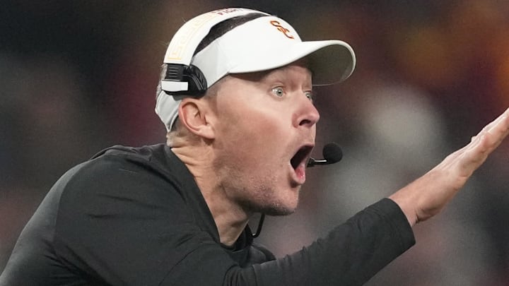 Dec 27, 2023; San Diego, CA, USA; Southern California Trojans head coach Lincoln Riley reacts in the second half against the Louisville Cardinals during the Holiday Bowl at Petco Park. Mandatory Credit: Kirby Lee-Imagn Images
