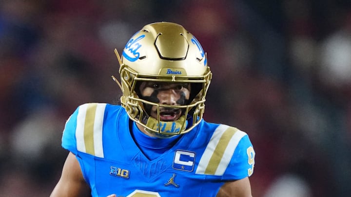 Nov 29, 2025; Los Angeles, California, USA; UCLA Bruins quarterback Nico Iamaleava (9) carries the ball against the Southern California Trojans in the first half at United Airlines Field at Los Angeles Memorial Coliseum. Mandatory Credit: Kirby Lee-Imagn Images Nov 29, 2025; Los Angeles, California, USA; UCLA Bruins quarterback Nico Iamaleava (9) carries the ball against the Southern California Trojans in the first half at United Airlines Field at Los Angeles Memorial Coliseum. Mandatory Credit: Kirby Lee-Imagn Images