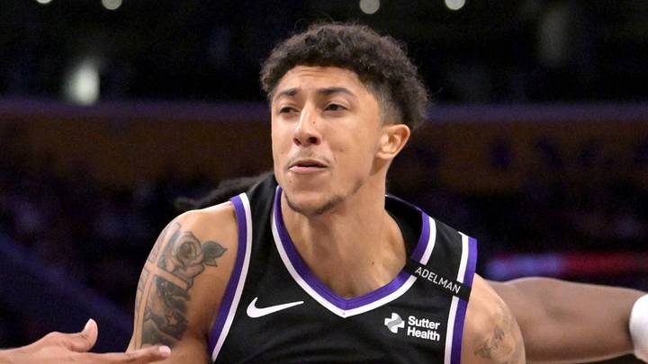 Oct 8, 2026; Los Angeles, California, USA;  Los Angeles Lakers guard Quentin Grimes (5) defends Sacramento Kings guard Nique Clifford (10) as he drives to the basket in the first half at Crypto.com Arena. Mandatory Credit: Jayne Kamin-Oncea-Imagn Images