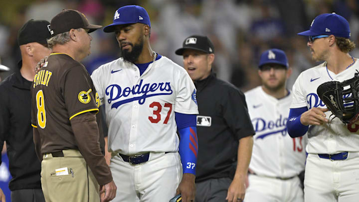 San Diego Padres manager Mike Shildt (8) talks with Los Angeles Dodgers right fielder Teoscar Hernandez (37) as play is about to resume after benches cleared in the eighth inning at Dodger Stadium on June 19.