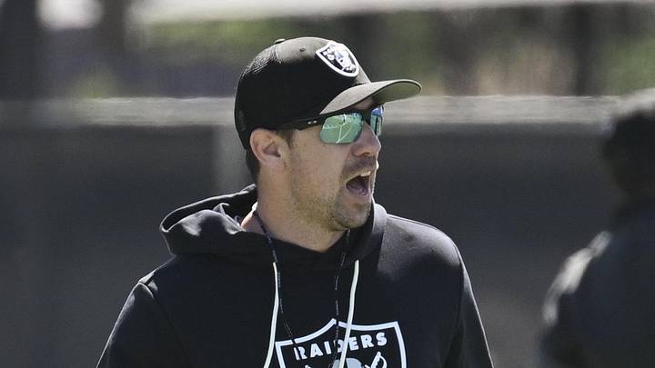 Las Vegas Raiders head coach Klint Kubiak looks on during organized team activities. Las Vegas Raiders head coach Klint Kubiak looks on during organized team activities.
