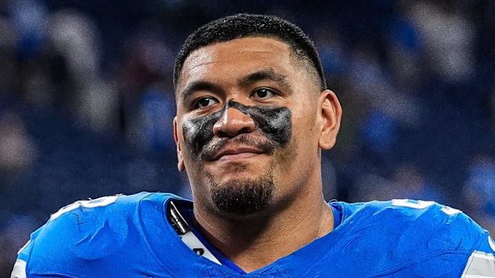 Detroit Lions offensive tackle Penei Sewell (58).