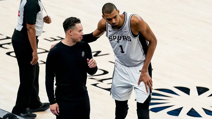 San Antonio Spurs coach Mitch Johnson talks with forward Victor Wembanyama (1) against the New York Knicks in the second half during Game 5 of the 2026 NBA Finals at Frost Bank Center. San Antonio Spurs coach Mitch Johnson talks with forward Victor Wembanyama (1) against the New York Knicks in the second half during Game 5 of the 2026 NBA Finals at Frost Bank Center.