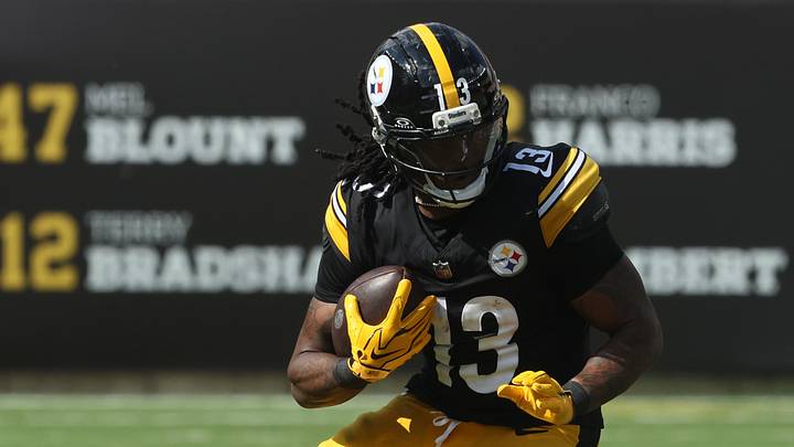 Sep 13, 2026; Pittsburgh, Pennsylvania, USA; Pittsburgh Steelers running back Rico Dowdle (13) runs against Atlanta Falcons linebacker Harold Perkins Jr. (56) during the third quarter at Acrisure Stadium. Mandatory Credit: Charles LeClaire-Imagn Images Sep 13, 2026; Pittsburgh, Pennsylvania, USA; Pittsburgh Steelers running back Rico Dowdle (13) runs against Atlanta Falcons linebacker Harold Perkins Jr. (56) during the third quarter at Acrisure Stadium. Mandatory Credit: Charles LeClaire-Imagn Images