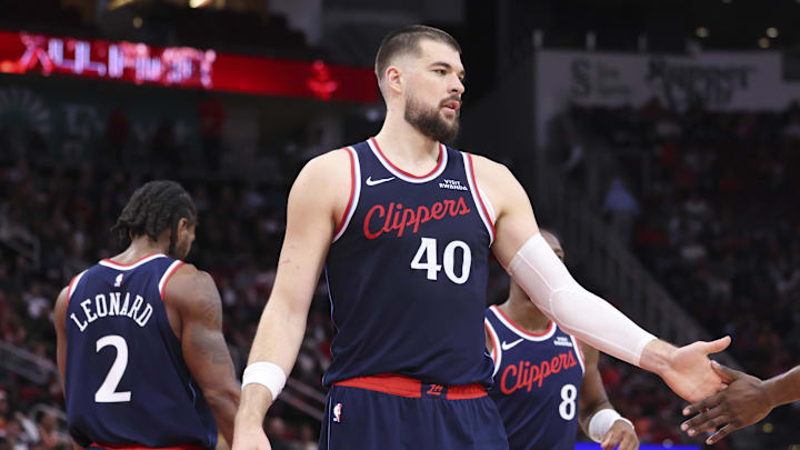 Dec 11, 2025; Houston, Texas, USA; Los Angeles Clippers center Ivica Zubac (40) shakes hands with guard James Harden (1) after a play during the second quarter against the Houston Rockets at Toyota Center. Mandatory Credit: Troy Taormina-Imagn Images Dec 11, 2025; Houston, Texas, USA; Los Angeles Clippers center Ivica Zubac (40) shakes hands with guard James Harden (1) after a play during the second quarter against the Houston Rockets at Toyota Center. Mandatory Credit: Troy Taormina-Imagn Images