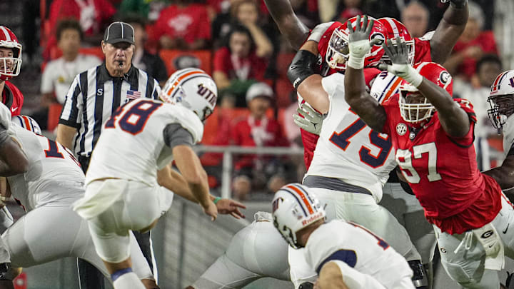 Sep 2, 2023; Athens, Georgia, USA; Georgia Bulldogs defensive lineman Warren Brinson (97) partially blocks a field goal attempt by Tennessee Martin Skyhawks place kicker Aidan Laros (48) during the second half at Sanford Stadium. Mandatory Credit: Dale Zanine-Imagn Images
