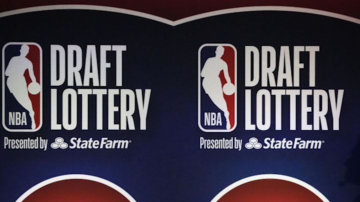May 12, 2025; Chicago, Illinois, US; A person watches the 2025 NBA Draft Lottery at McCormick Place. Mandatory Credit: David Banks-Imagn Images
