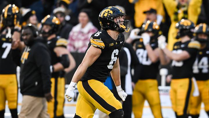 Nov 22, 2025; Iowa City, Iowa, USA; Iowa Hawkeyes defensive back Zach Lutmer (6) reacts after making an interception against the Michigan State Spartans during the second quarter at Kinnick Stadium. Mandatory Credit: Jeffrey Becker-Imagn Images Nov 22, 2025; Iowa City, Iowa, USA; Iowa Hawkeyes defensive back Zach Lutmer (6) reacts after making an interception against the Michigan State Spartans during the second quarter at Kinnick Stadium. Mandatory Credit: Jeffrey Becker-Imagn Images