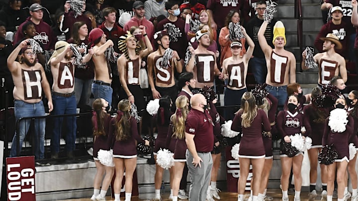 Mississippi State Bulldogs fans cheer during the second half of the game against the Mississippi Rebels at Humphrey Coliseum. Mississippi State Bulldogs fans cheer during the second half of the game against the Mississippi Rebels at Humphrey Coliseum.