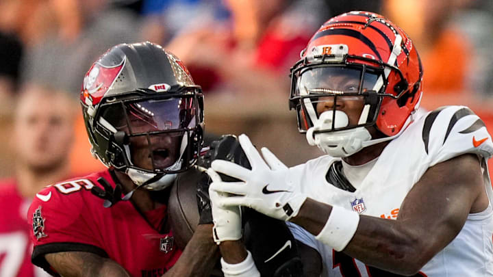 Tampa Bay Buccaneers cornerback Keenan Isaac (16) intercepts a pass intended for Cincinnati Bengals wide receiver Kwamie Lassiter II (18) in the second quarter of the NFL Preseason Week 1 game between the Cincinnati Bengals and the Tampa Bay Buccaneers at Paycor Stadium in downtown Cincinnati on Saturday, Aug. 10, 2024.
