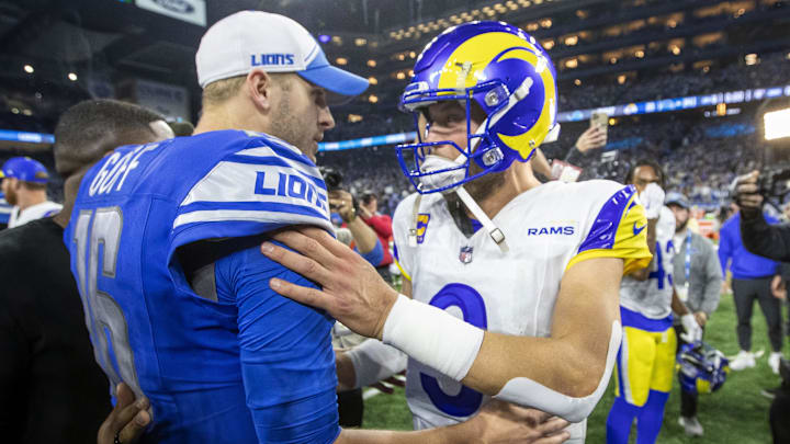 Detroit Lions quarterback Jared Goff (16) and Los Angeles Rams quarterback Matthew Stafford (9) greet each other 