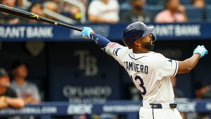 Jun 28, 2026; St. Petersburg, Florida, USA; Tampa Bay Rays third baseman Junior Caminero (13) hits a home run against the Arizona Diamondbacks in the fifth inning at Tropicana Field. Jun 28, 2026; St. Petersburg, Florida, USA; Tampa Bay Rays third baseman Junior Caminero (13) hits a home run against the Arizona Diamondbacks in the fifth inning at Tropicana Field.