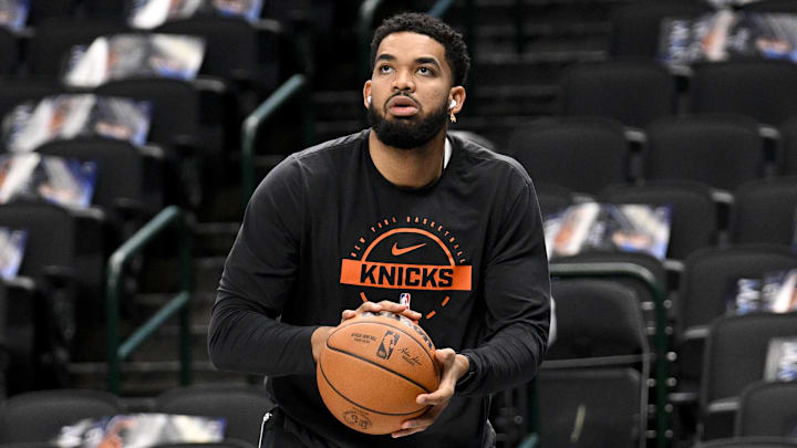 Nov 19, 2025; Dallas, Texas, USA; New York Knicks center Karl-Anthony Towns (32) warms up before the game against the Dallas Mavericks at the American Airlines Center. Mandatory Credit: Jerome Miron-Imagn Images