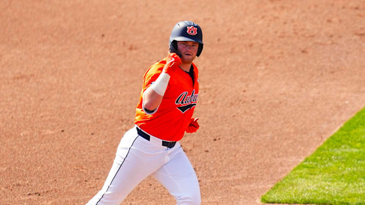 Auburn Tigers slugger Chase Fralick fist pumps after nuking one against Nebraska on Sunday. Auburn Tigers slugger Chase Fralick fist pumps after nuking one against Nebraska on Sunday.