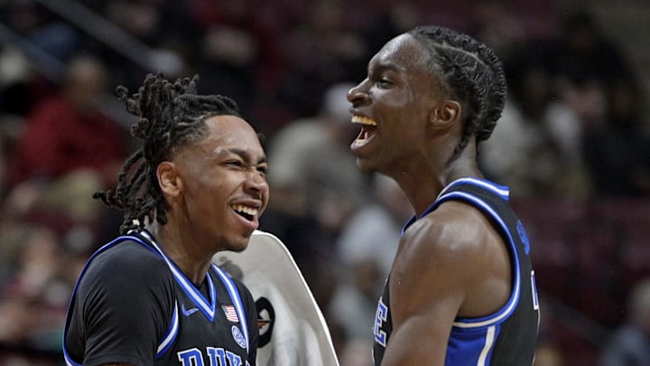 Jan 3, 2026; Tallahassee, Florida, USA; Duke Blue Devils guard Dame Sarr (7) celebrates making a three point shot with guard Isaiah Evans (3) during the second half against the Florida State Seminoles at Donald L. Tucker Center. Mandatory Credit: Melina Myers-Imagn Images