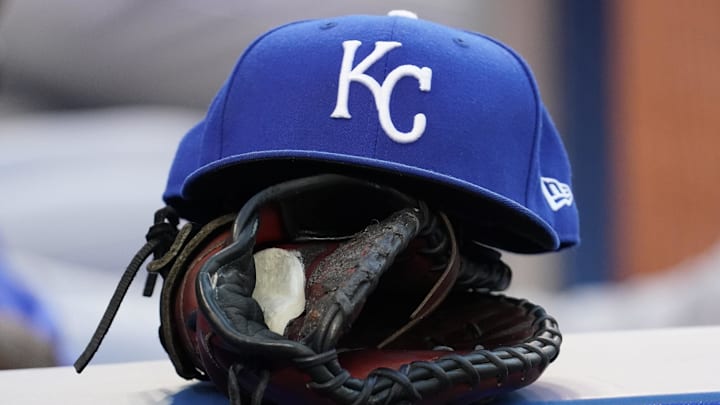 Jul 30, 2021; Toronto, Ontario, CAN; A Kansas City Royals hat and glove in the dugout during a game against the Toronto Blue Jays at Rogers Centre. Jul 30, 2021; Toronto, Ontario, CAN; A Kansas City Royals hat and glove in the dugout during a game against the Toronto Blue Jays at Rogers Centre.