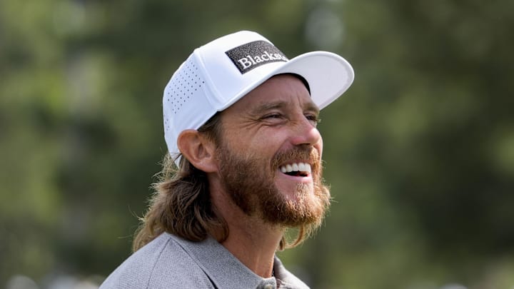 Tommy Fleetwood smiles on the second hole