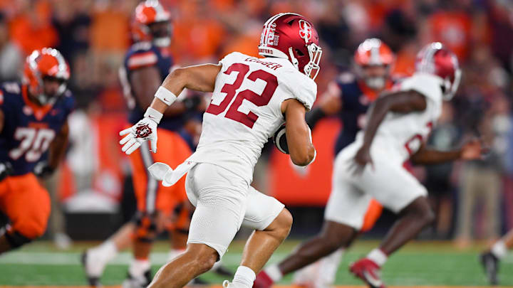 Sep 20, 2024; Syracuse, New York, USA; Stanford Cardinal safety Mitch Leigber (32) returns an interception for a touchdown against the Syracuse Orange during the second half at the JMA Wireless Dome. Mandatory Credit: Rich Barnes-Imagn Images Sep 20, 2024; Syracuse, New York, USA; Stanford Cardinal safety Mitch Leigber (32) returns an interception for a touchdown against the Syracuse Orange during the second half at the JMA Wireless Dome. Mandatory Credit: Rich Barnes-Imagn Images