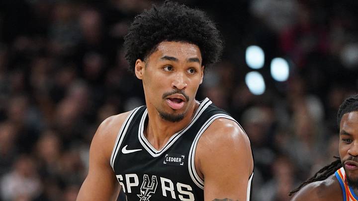 May 28, 2026; San Antonio, Texas, USA; San Antonio Spurs guard Dylan Harper (2) dribbles the ball past Oklahoma City Thunder guard Cason Wallace (22) in the first half during game six of the western conference finals for the 2026 NBA playoffs at Frost Bank Center. Mandatory Credit: Dustin Safranek-Imagn Images