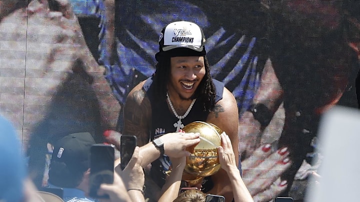 Jun 24, 2025; Oklahoma City, OK, USA; Oklahoma City Thunder forward Jaylin Williams lets fans touch the Larry O'Brien Championship Trophy during the Oklahoma City Thunder Champions parade. Center. Mandatory Credit: Alonzo Adams-Imagn Images Jun 24, 2025; Oklahoma City, OK, USA; Oklahoma City Thunder forward Jaylin Williams lets fans touch the Larry O'Brien Championship Trophy during the Oklahoma City Thunder Champions parade. Center. Mandatory Credit: Alonzo Adams-Imagn Images