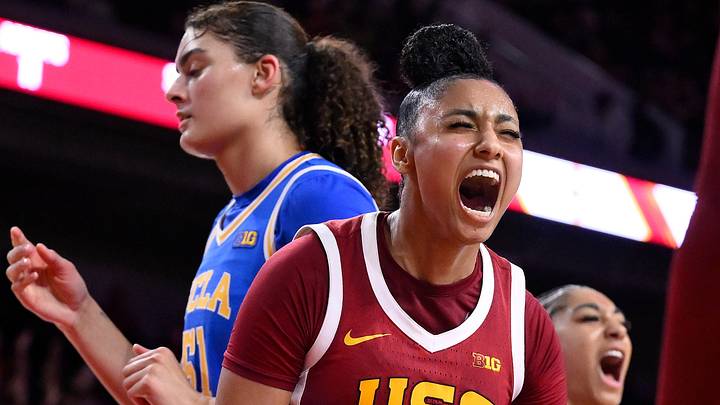 Feb 13, 2025; Los Angeles, California, USA; USC Trojans guard JuJu Watkins (12) lets out a yell after scoring in the fourth quarter against the UCLA Bruins at Galen Center. Mandatory Credit: Robert Hanashiro-Imagn Images