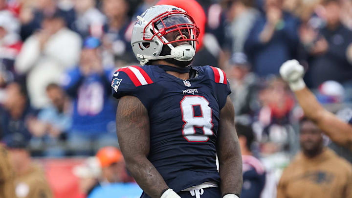 Nov 5, 2023; Foxborough, Massachusetts, USA; New England Patriots linebacker Ja'Whaun Bentley (8) celebrates after sacking Washington Commanders quarterback Sam Howell (14) during the second half at Gillette Stadium. Mandatory Credit: Paul Rutherford-Imagn Images