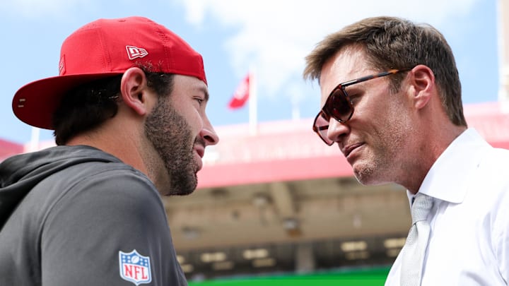 Sep 28, 2025; Tampa, Florida, USA; Tampa Bay Buccaneers quarterback Baker Mayfield (6), left, speaks with Tom Brady before the game against the Philadelphia Eagles  at Raymond James Stadium. Mandatory Credit: Nathan Ray Seebeck-Imagn Images