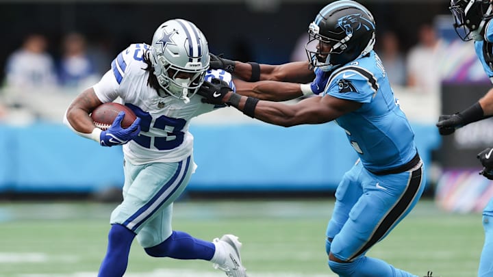 Dallas Cowboys running back Jaydon Blue runs with the ball during the second quarter against the Carolina Panthers.