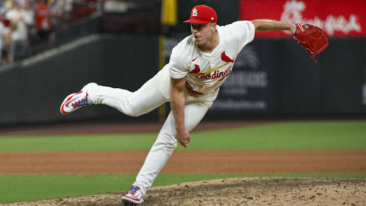 Jul 24, 2025; St. Louis, Missouri, USA;  St. Louis Cardinals relief pitcher Ryan Helsley (56) pitches against the San Diego Padres during the ninth inning at Busch Stadium.
