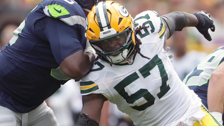 Green Bay Packers defensive end Brenton Cox Jr. (57) rushes against Seattle Seahawks offensive tackle Michael Jerrell (65) on Saturday, August 23, 2025, at Lambeau Field in Green Bay, Wis. The Packers defeated the Seahawks 20-7. Green Bay Packers defensive end Brenton Cox Jr. (57) rushes against Seattle Seahawks offensive tackle Michael Jerrell (65) on Saturday, August 23, 2025, at Lambeau Field in Green Bay, Wis. The Packers defeated the Seahawks 20-7.