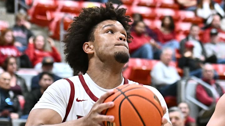 Oct 25, 2025; Pullman, WA, USA; Washington State Cougars forward Eemeli Yalaho (2) shoots the ball against New Mexico Lobos guard Jake Hall (23) in the second half at Friel Court at Beasley Coliseum. Mandatory Credit: James Snook-Imagn Images