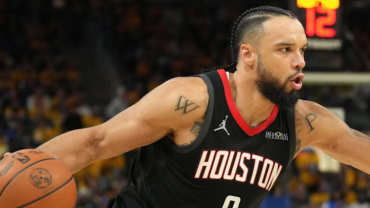 Apr 26, 2025; San Francisco, California, USA; Houston Rockets forward Dillon Brooks (9) dribbles against Golden State Warriors guard Stephen Curry (right) during the third quarter of game three of first round for the 2024 NBA Playoffs at Chase Center. Mandatory Credit: Darren Yamashita-Imagn Images