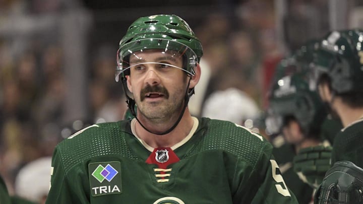 Oct 7, 2023; Saint Paul, Minnesota, USA; Minnesota Wild defense Jacob Middleton (5) celebrates his goal against the Dallas Stars during the first period at Xcel Energy Center. Mandatory Credit: Nick Wosika-Imagn Images

